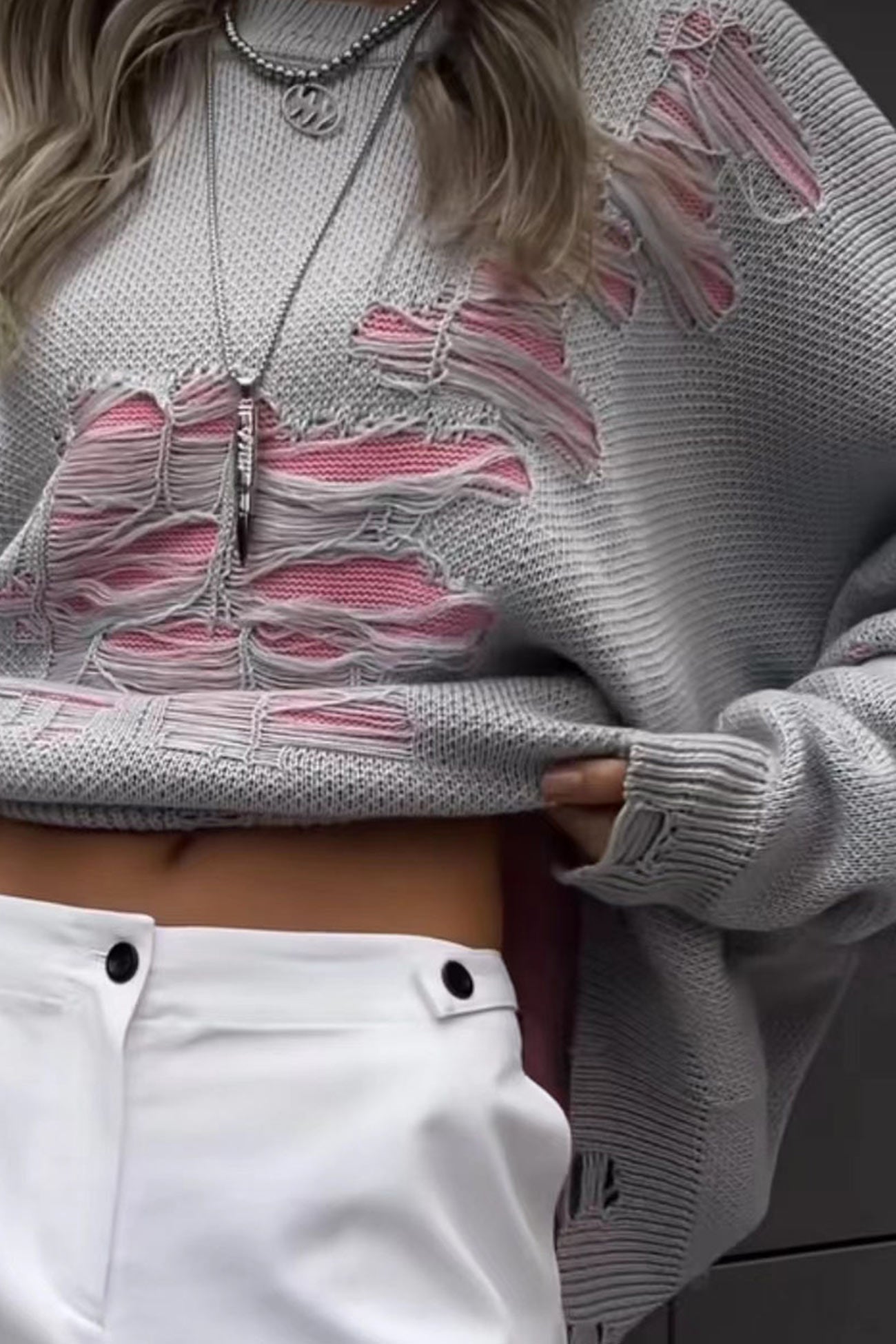 Monique | Contrast sweater with a distressed look