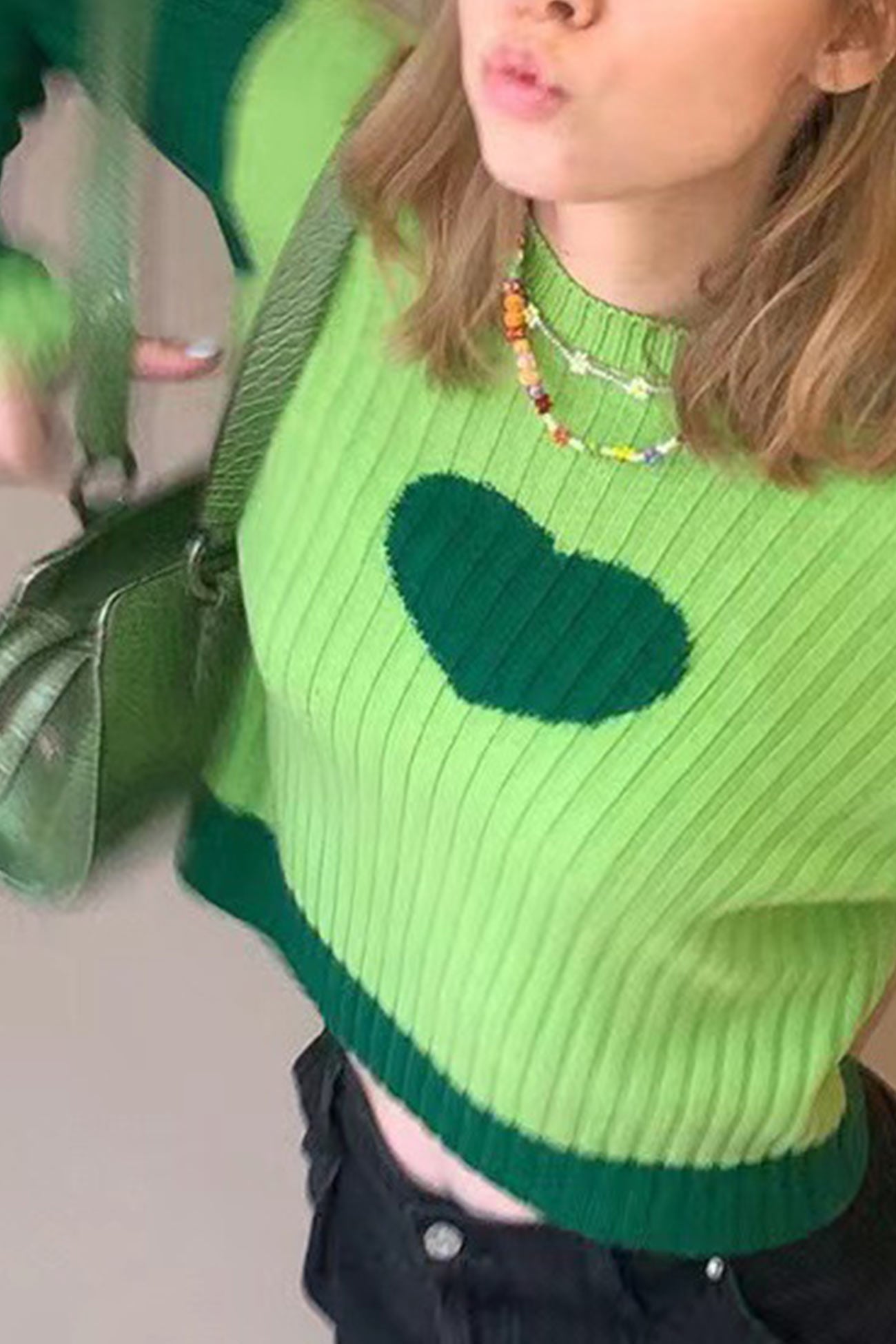 Helena | Contrasting rib-knit tops with a stand-up collar and heart graphic