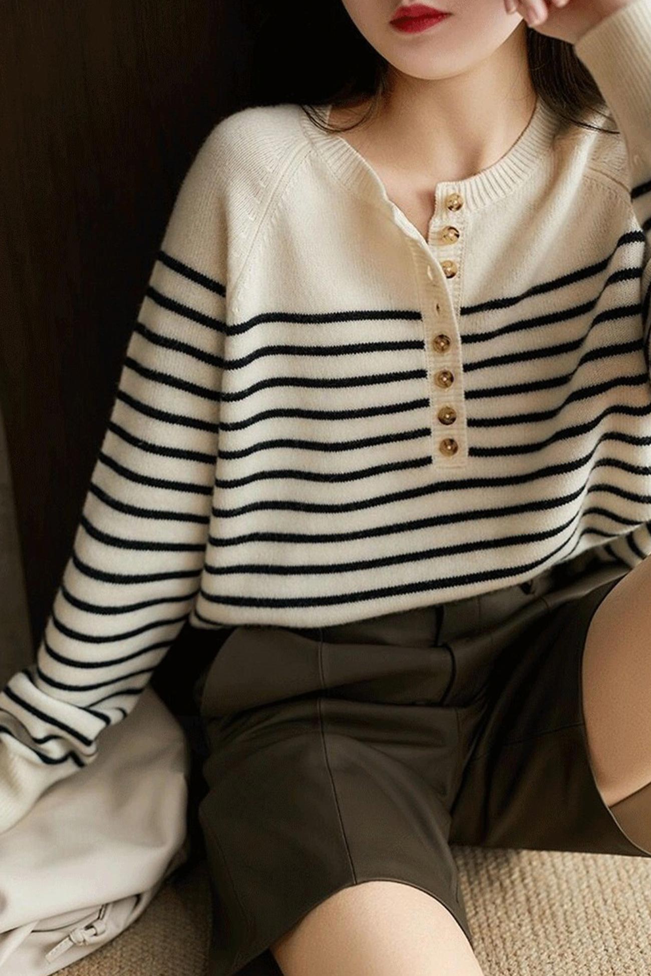 Paula | Striped sweater with a crew neck and button placket at the front