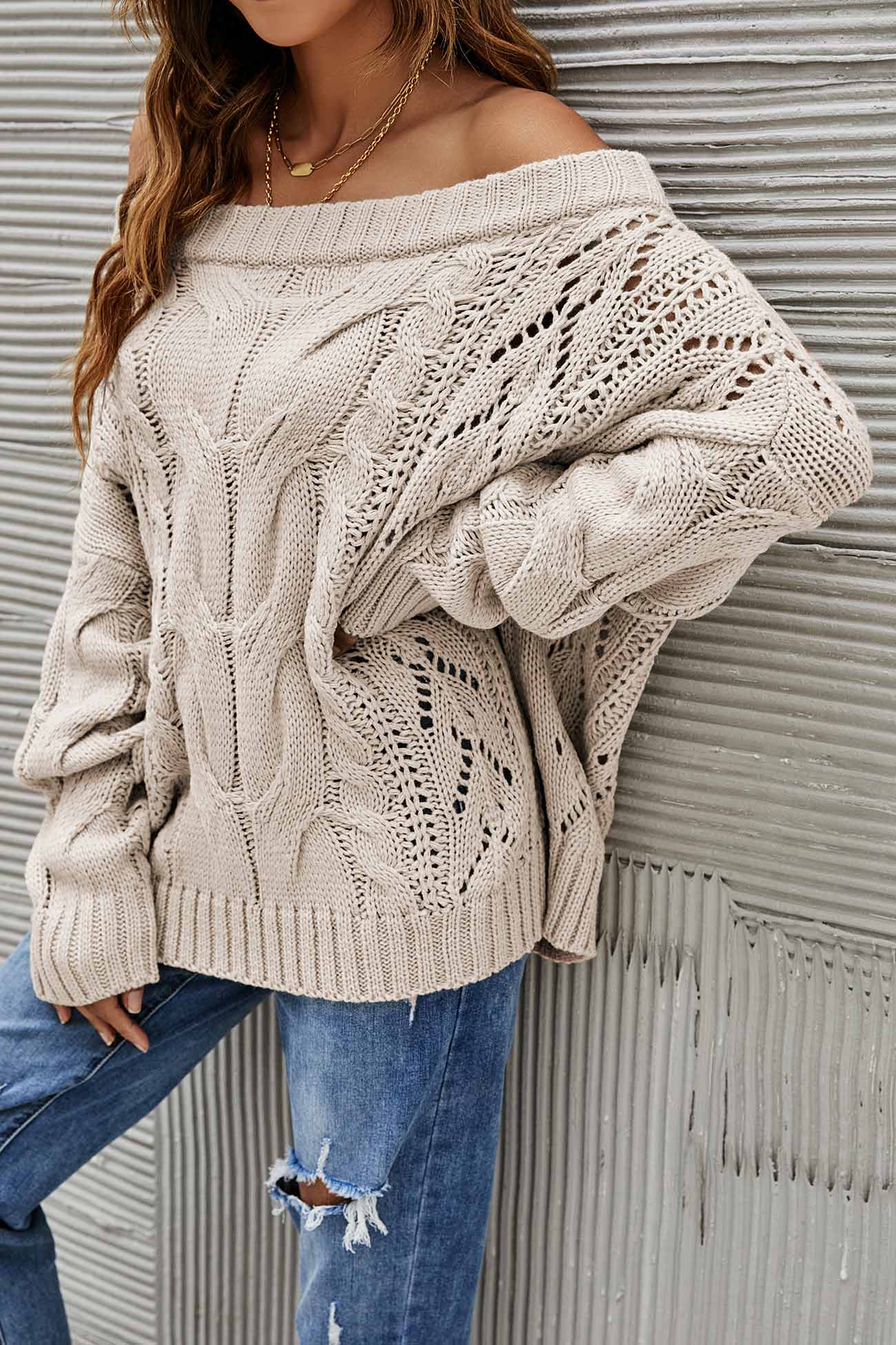 Janine | Knitted jumper with a dropped shoulder and a hollowed-out cable pattern