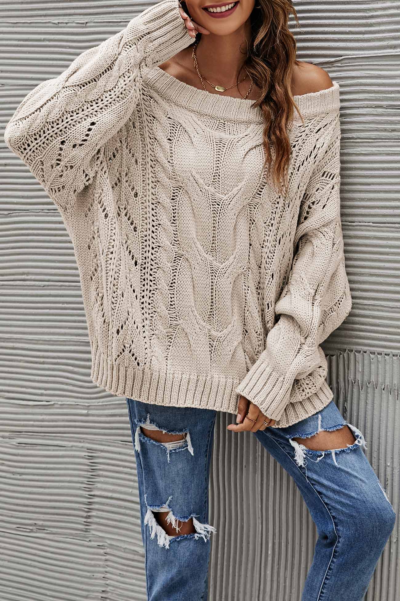 Janine | Knitted jumper with a dropped shoulder and a hollowed-out cable pattern