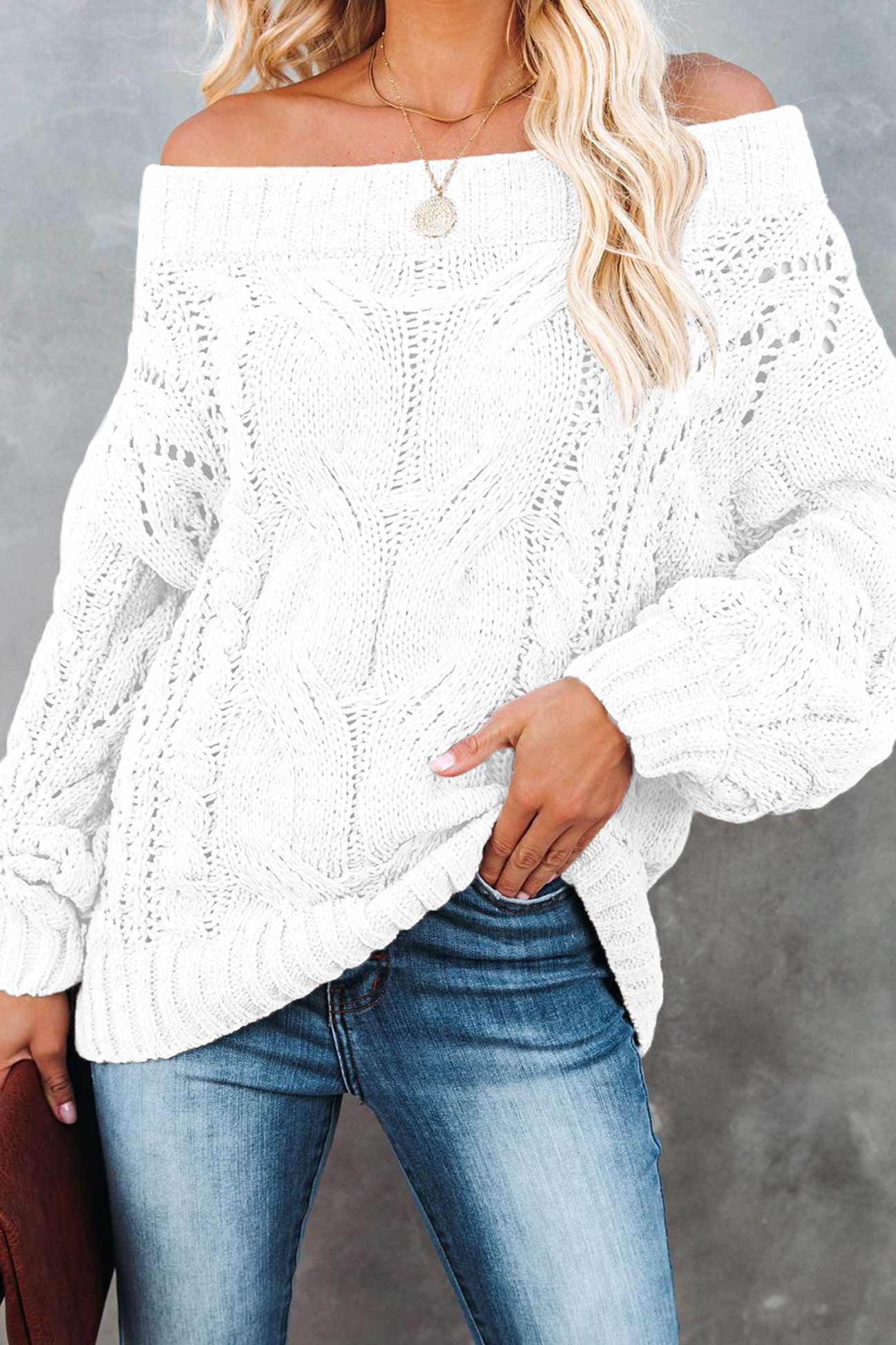 Janine | Knitted jumper with a dropped shoulder and a hollowed-out cable pattern