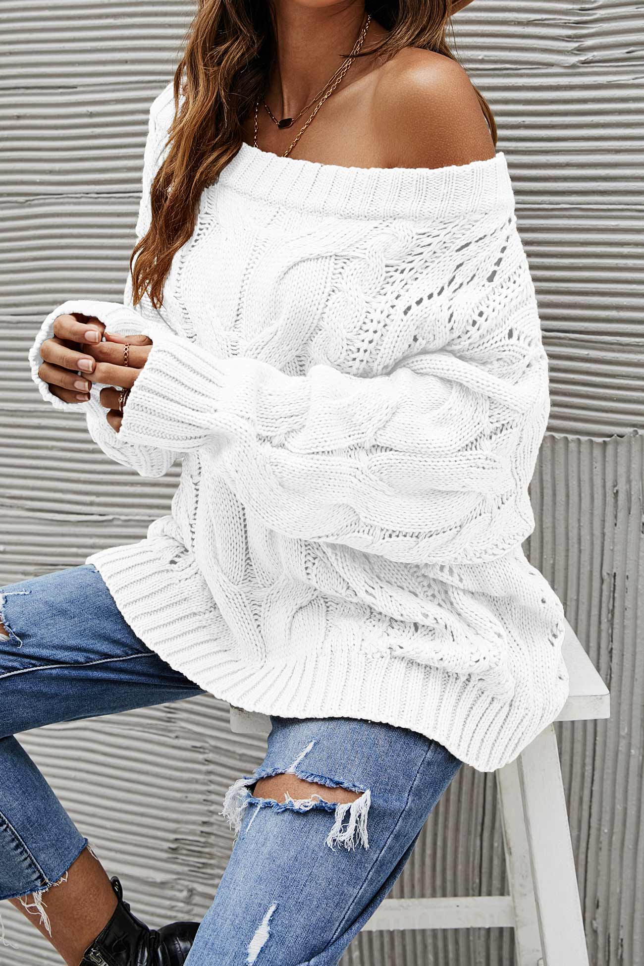 Janine | Knitted jumper with a dropped shoulder and a hollowed-out cable pattern