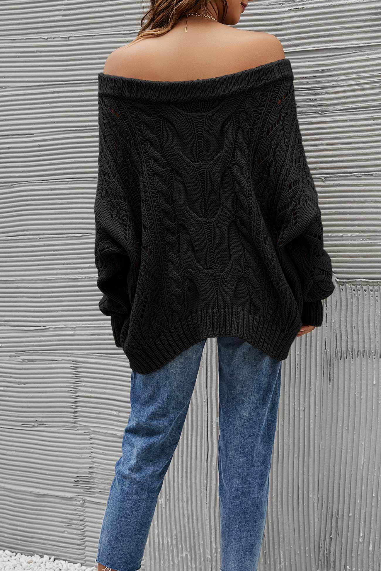 Janine | Knitted jumper with a dropped shoulder and a hollowed-out cable pattern