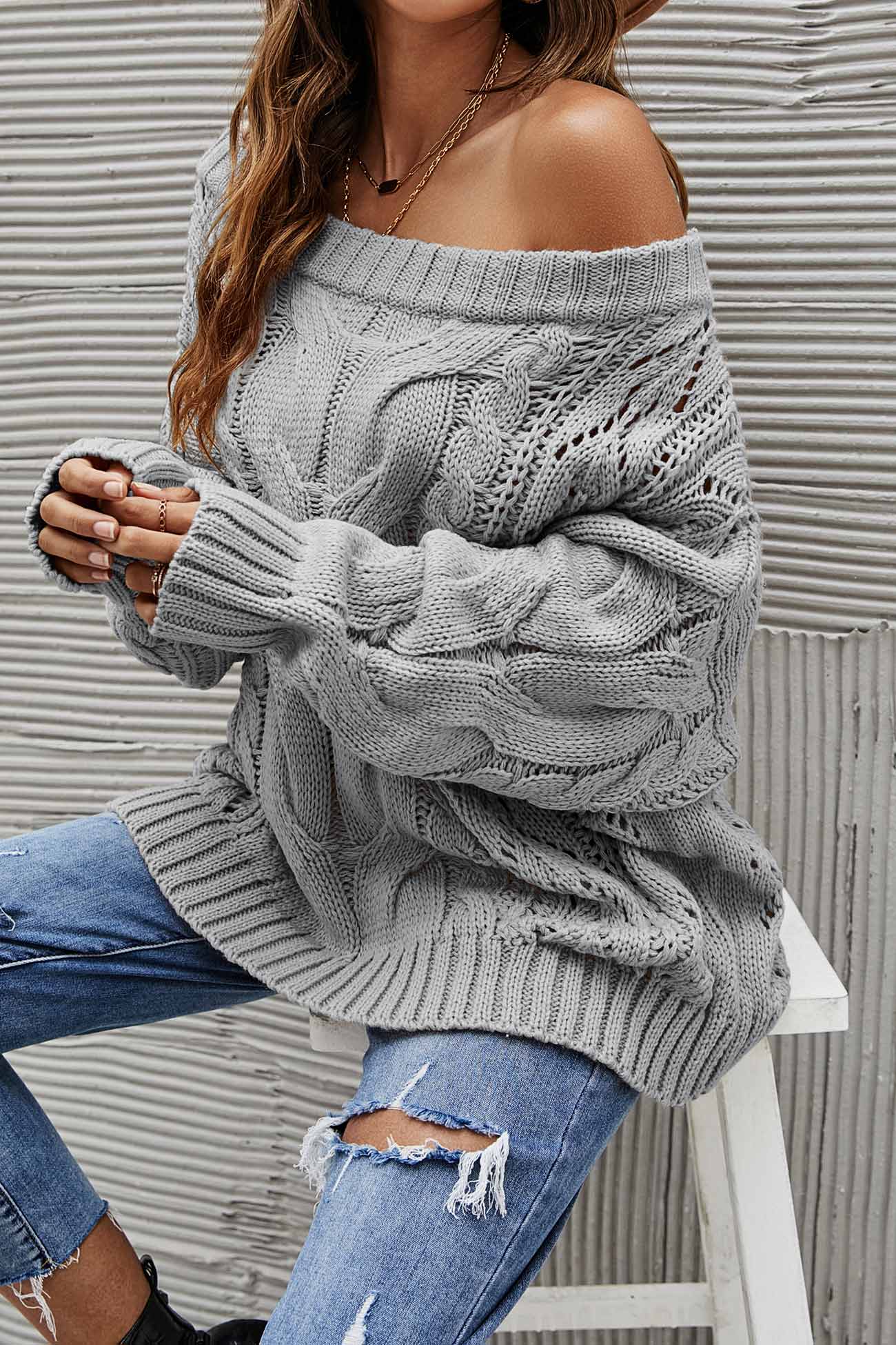 Janine | Knitted jumper with a dropped shoulder and a hollowed-out cable pattern