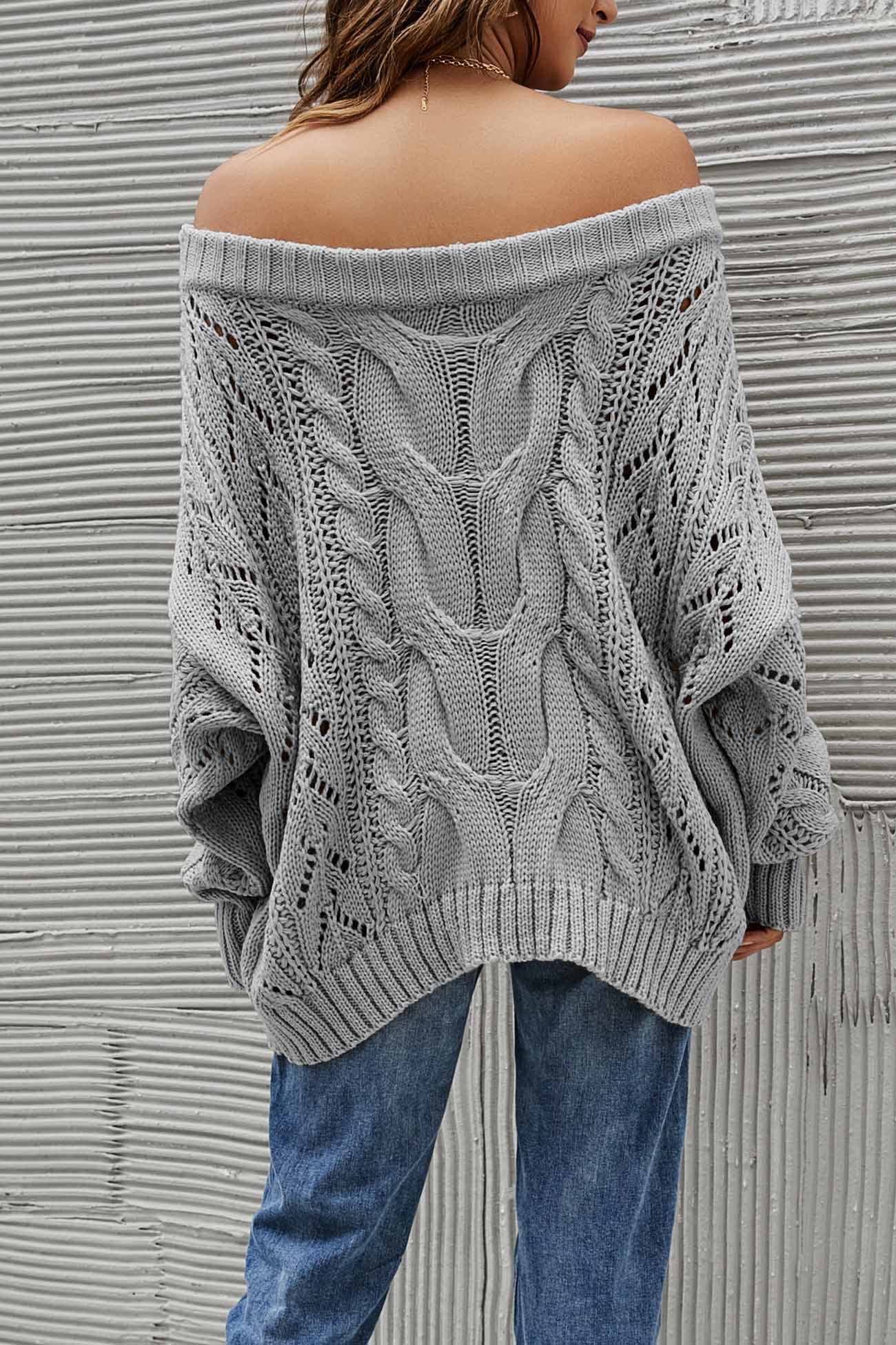 Janine | Knitted jumper with a dropped shoulder and a hollowed-out cable pattern