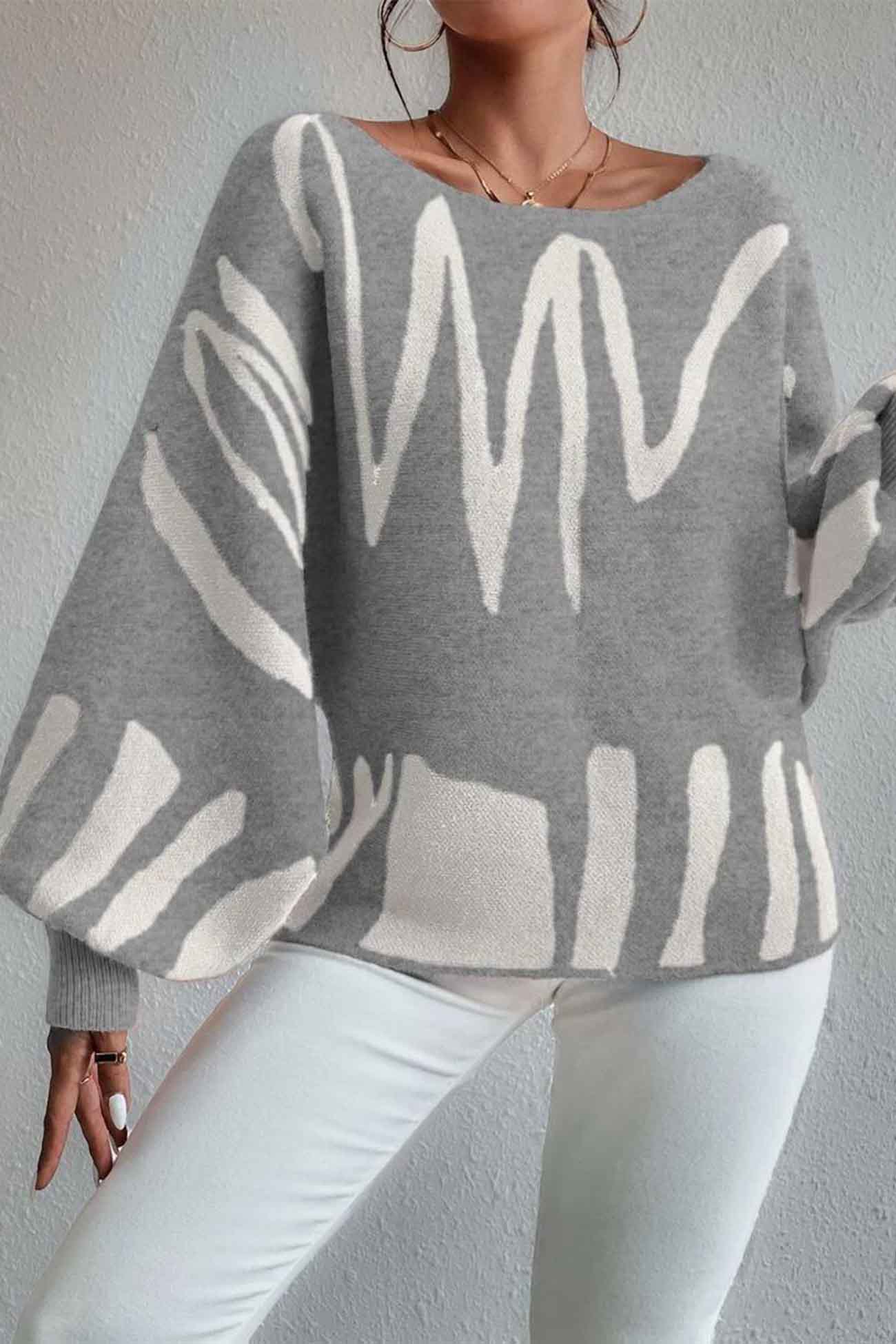 Anika | Knitted sweater with geometric lantern sleeves