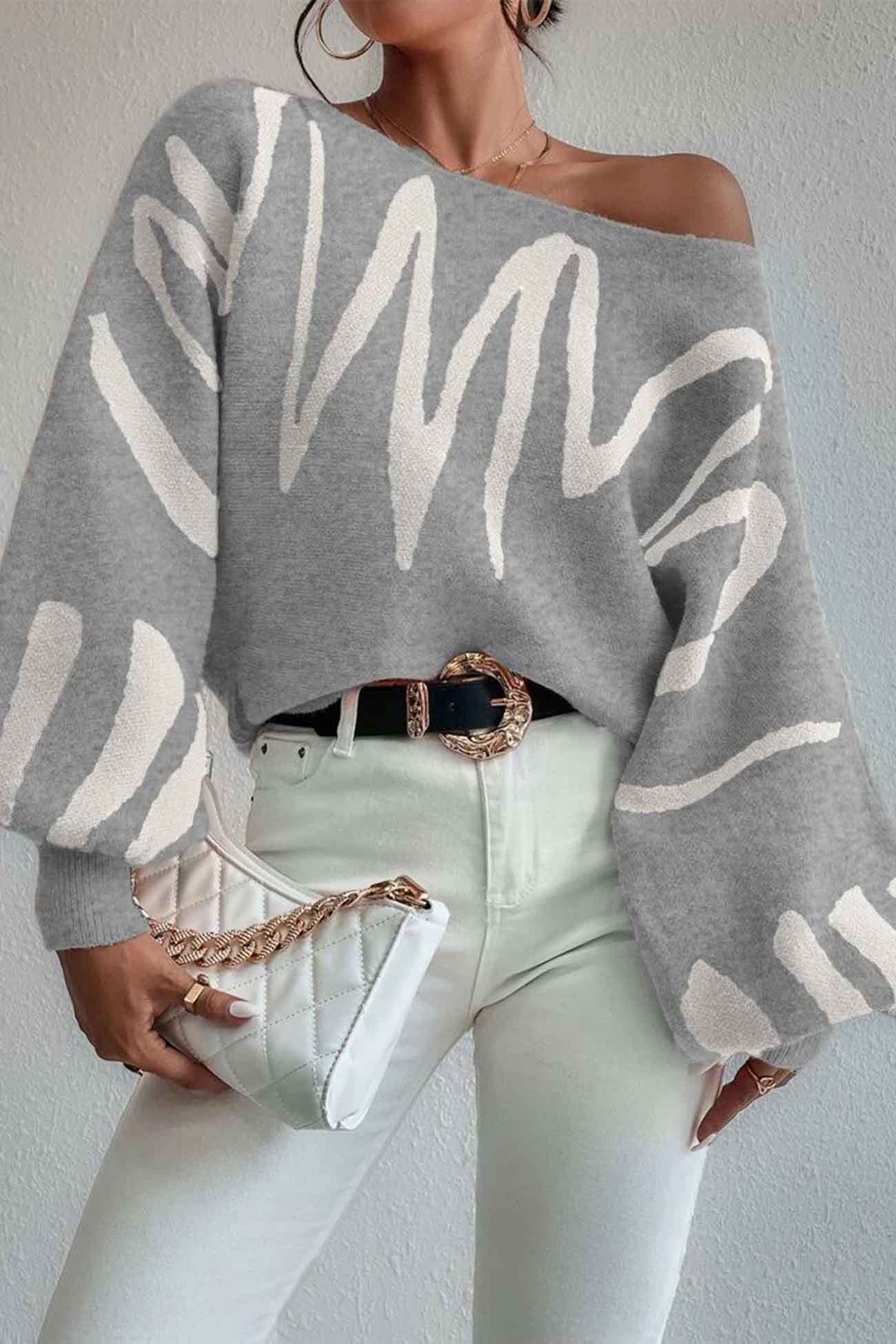 Anika | Knitted sweater with geometric lantern sleeves