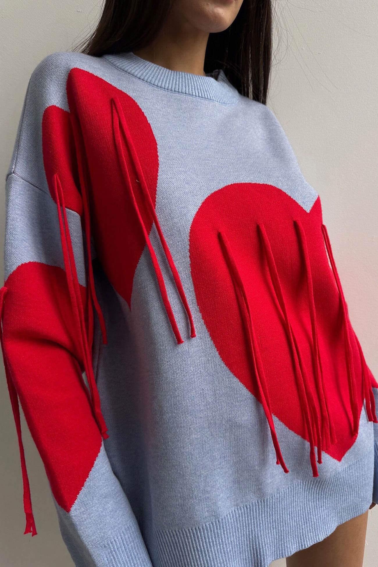 Marlies | Fringe sweater with heart graphic