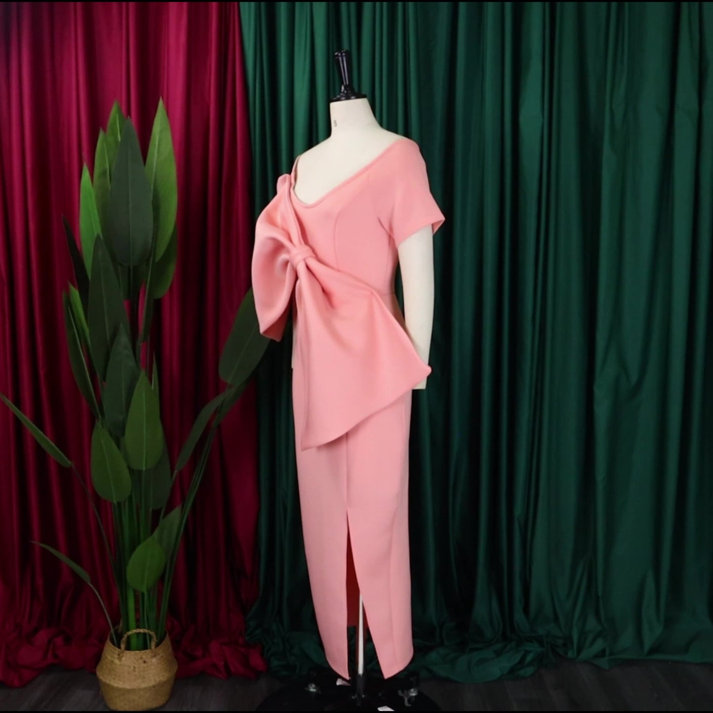 Dress With A Large Bow Slit