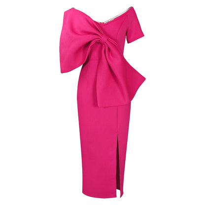Dress With A Large Bow Slit