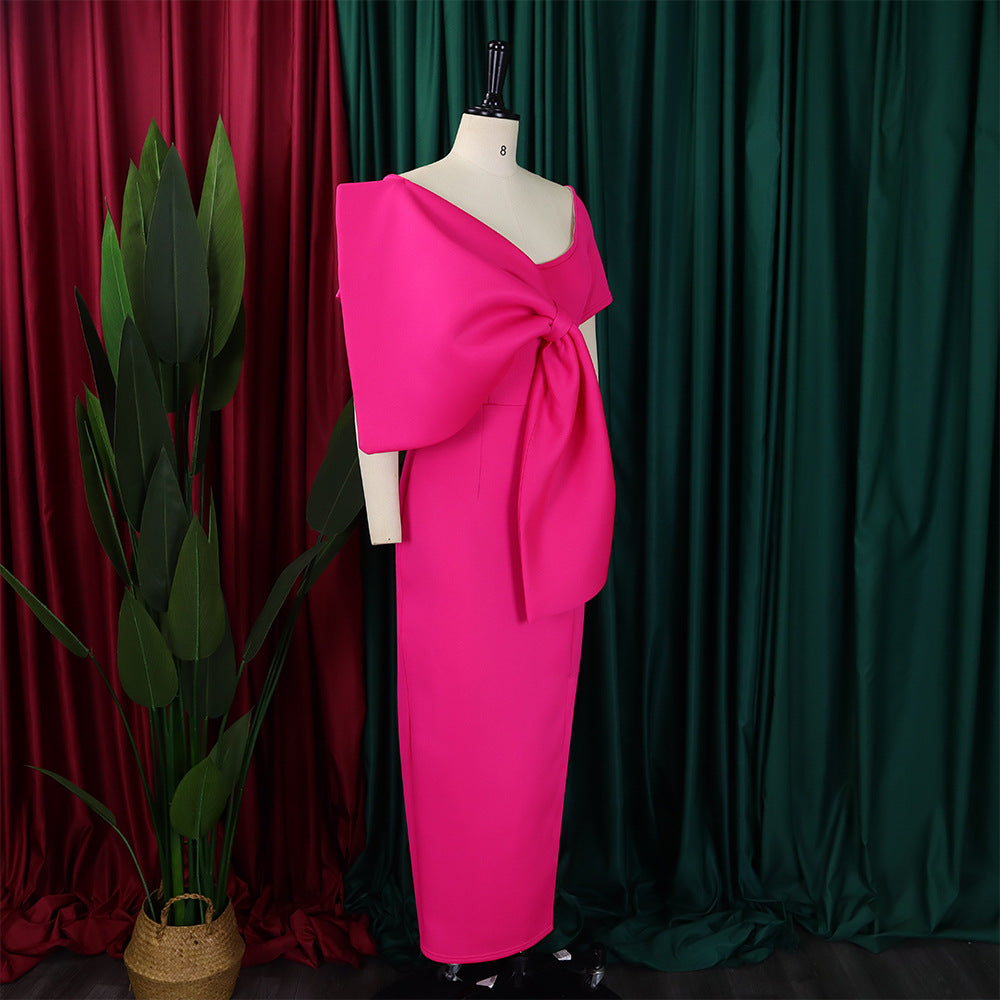 Dress With A Large Bow Slit