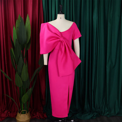 Dress With A Large Bow Slit