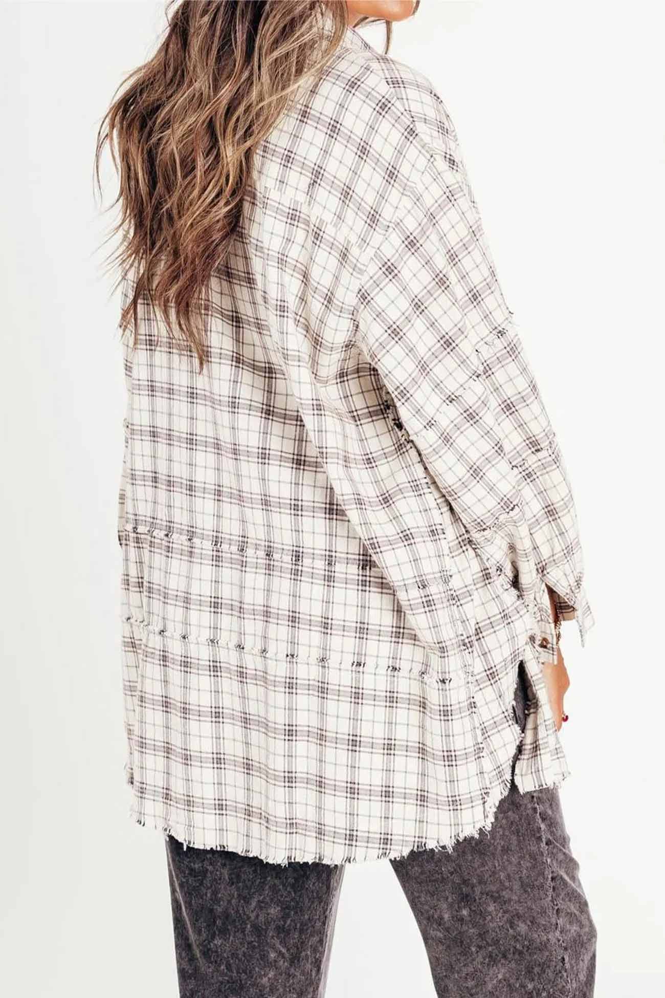 Vanja | Checked blouse with button placket, fringes and slit hem