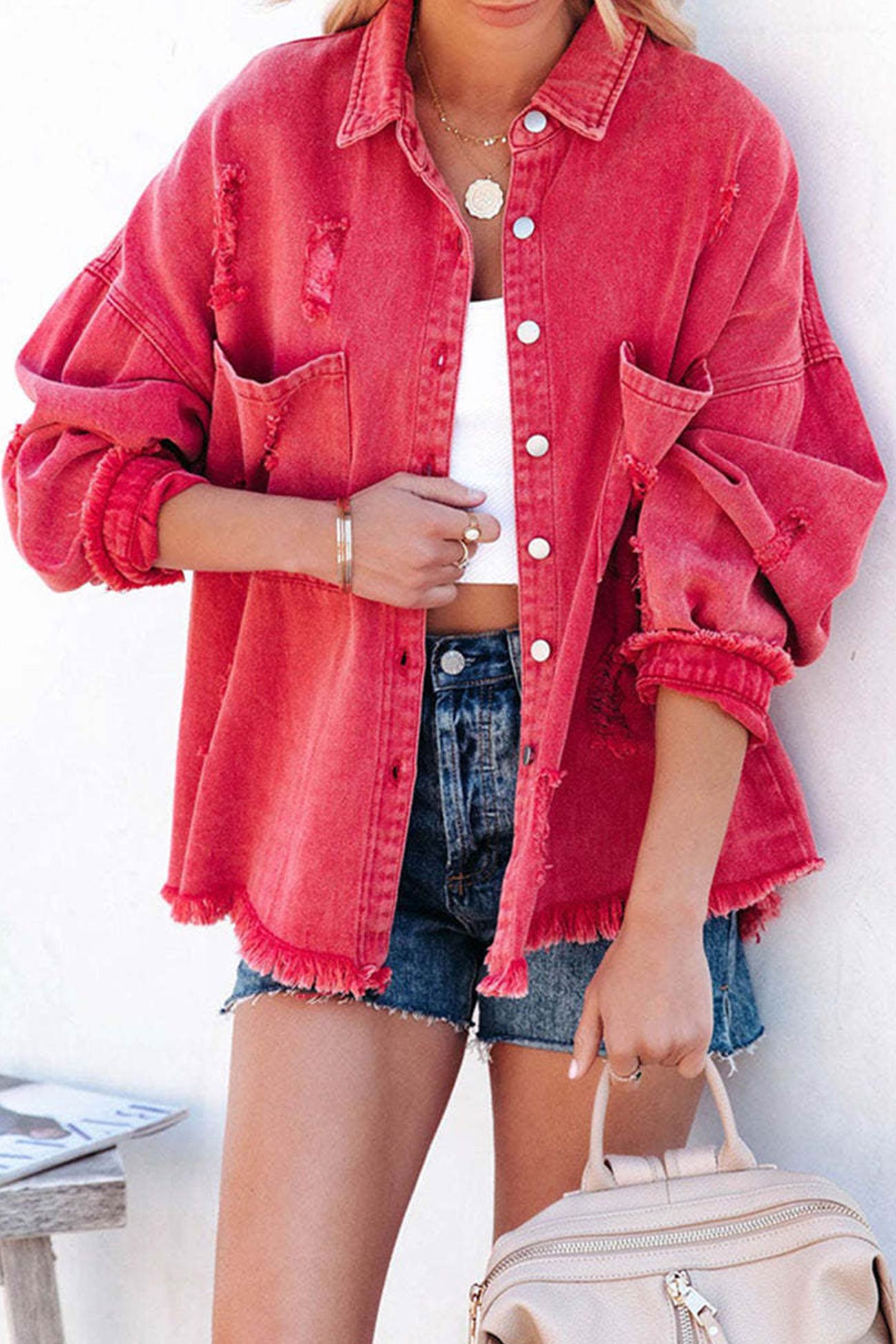 Sara | Solid color distressed denim jacket with pockets