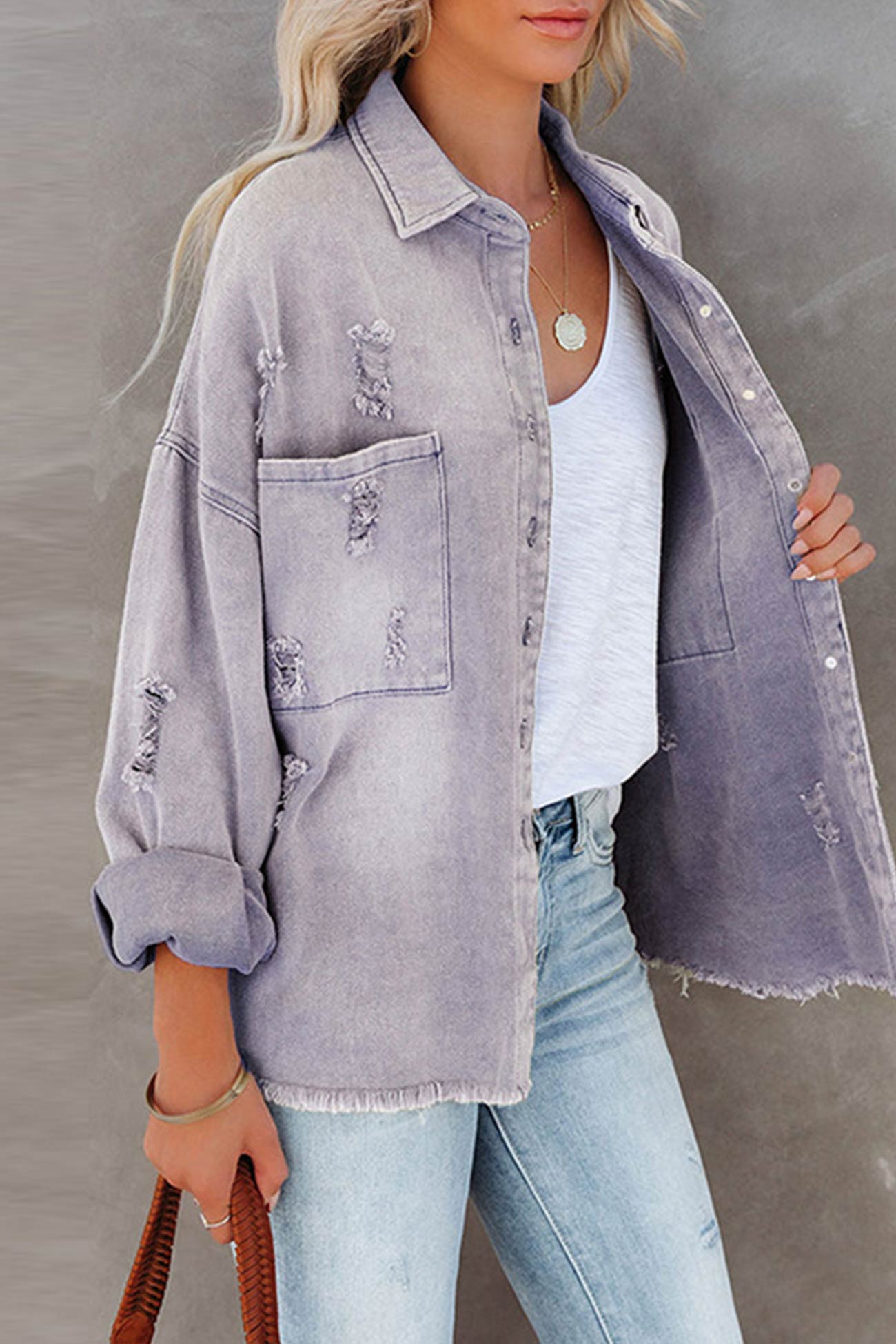 Sara | Solid color distressed denim jacket with pockets