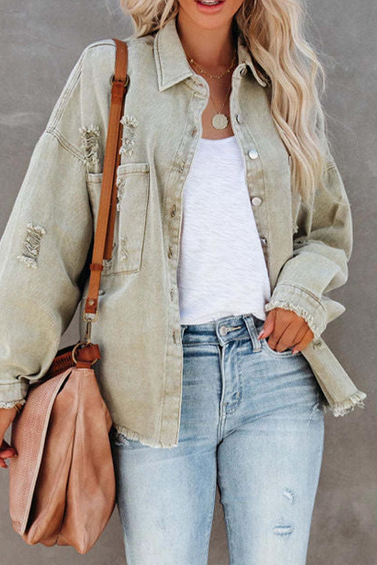 Sara | Solid color distressed denim jacket with pockets