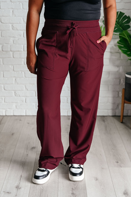 Nerea | Runner's high drawstring jogging pants in Red Merlot