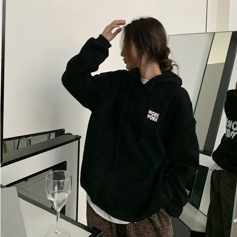 Pink | Warm, loose-fitting sweater with a hood
