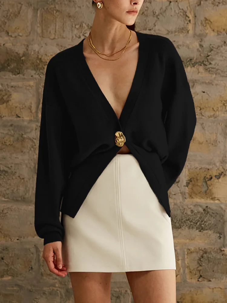 Brigida | Stylish women's knitted sweater with a button placket in a solid color