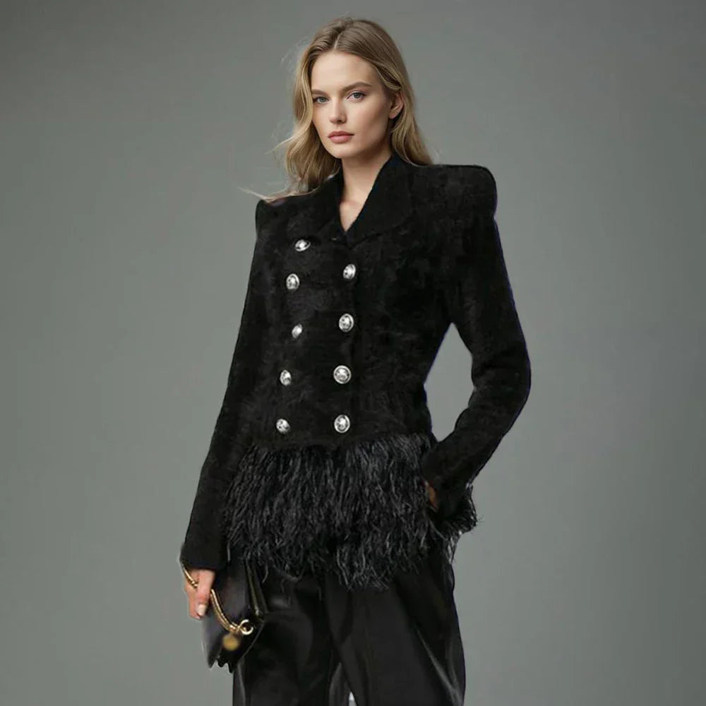 Natividad | Patchwork blazer with feather accessories