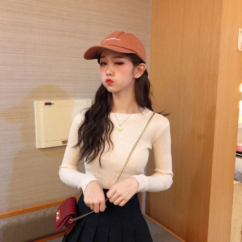 Lorena | Rib-knit sweater with long sleeves and a slim fit