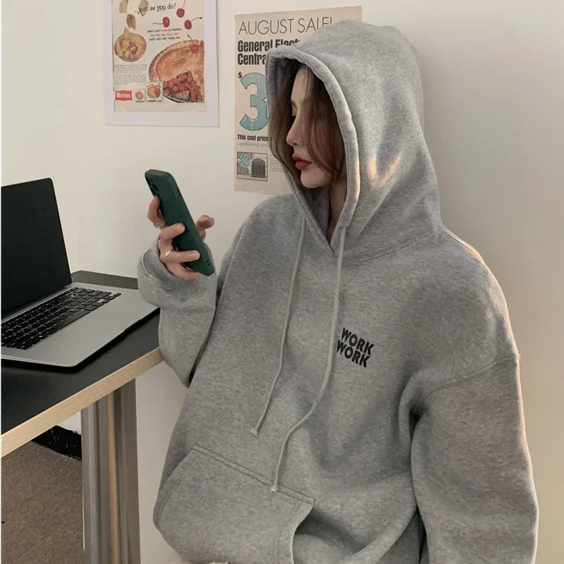 Pink | Warm, loose-fitting sweater with a hood