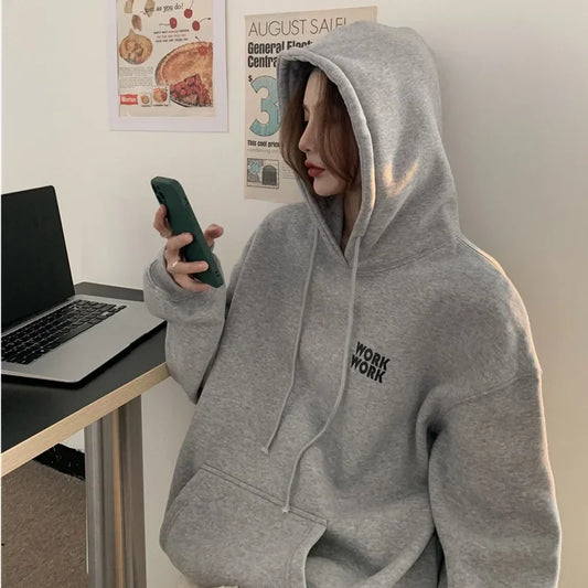 Pink | Warm, loose-fitting sweater with a hood