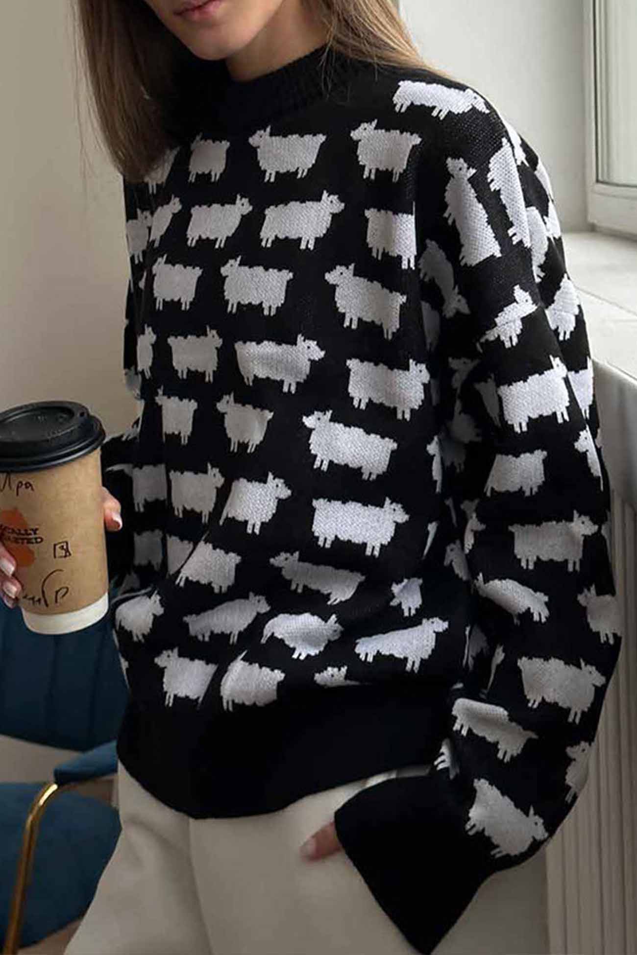 Dagmar | Long-sleeved sweater with a crew neck and a sheep pattern