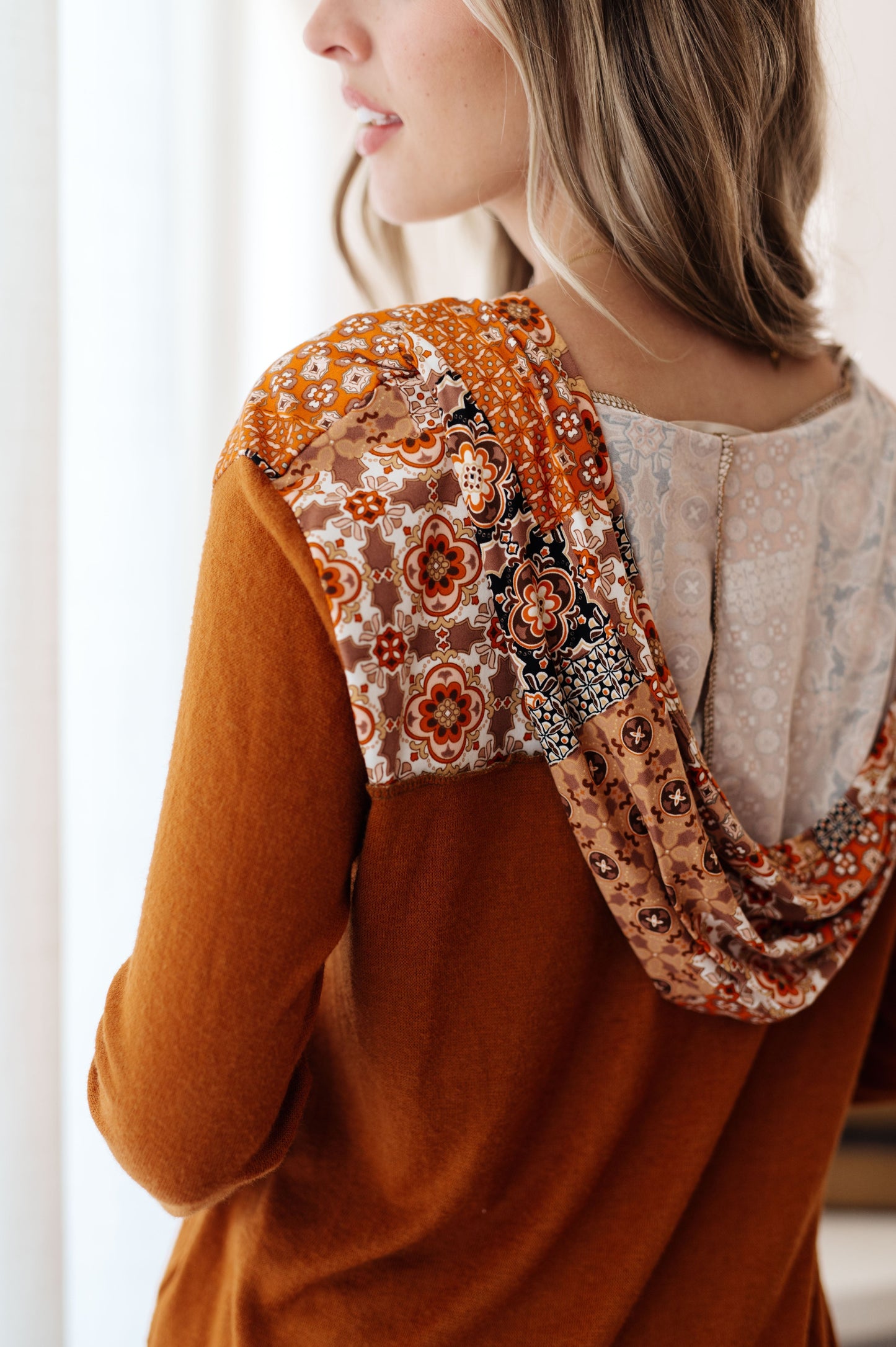Elin | Sipping Iced Tea mixed print hoodie.