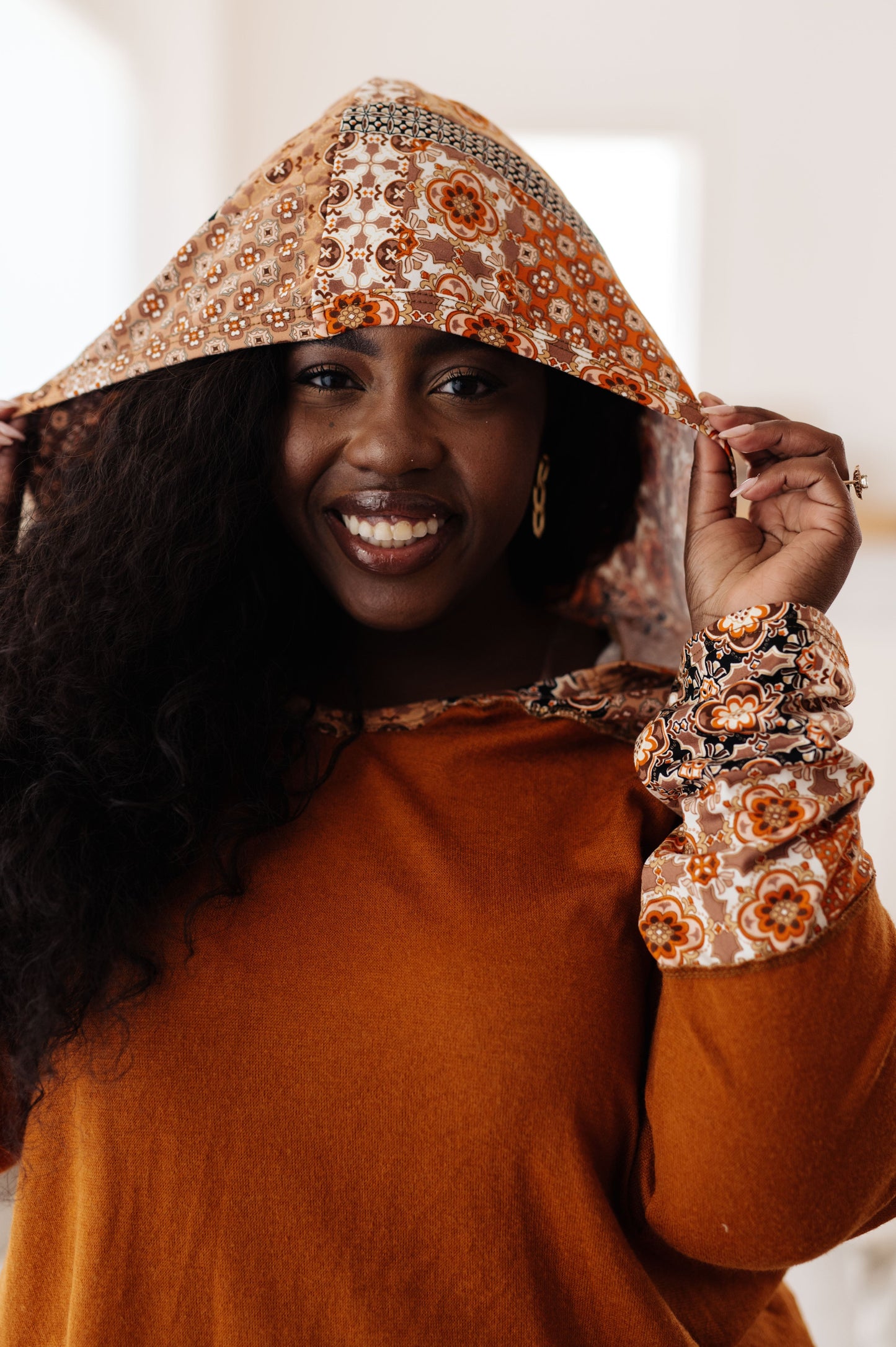 Elin | Sipping Iced Tea mixed print hoodie.