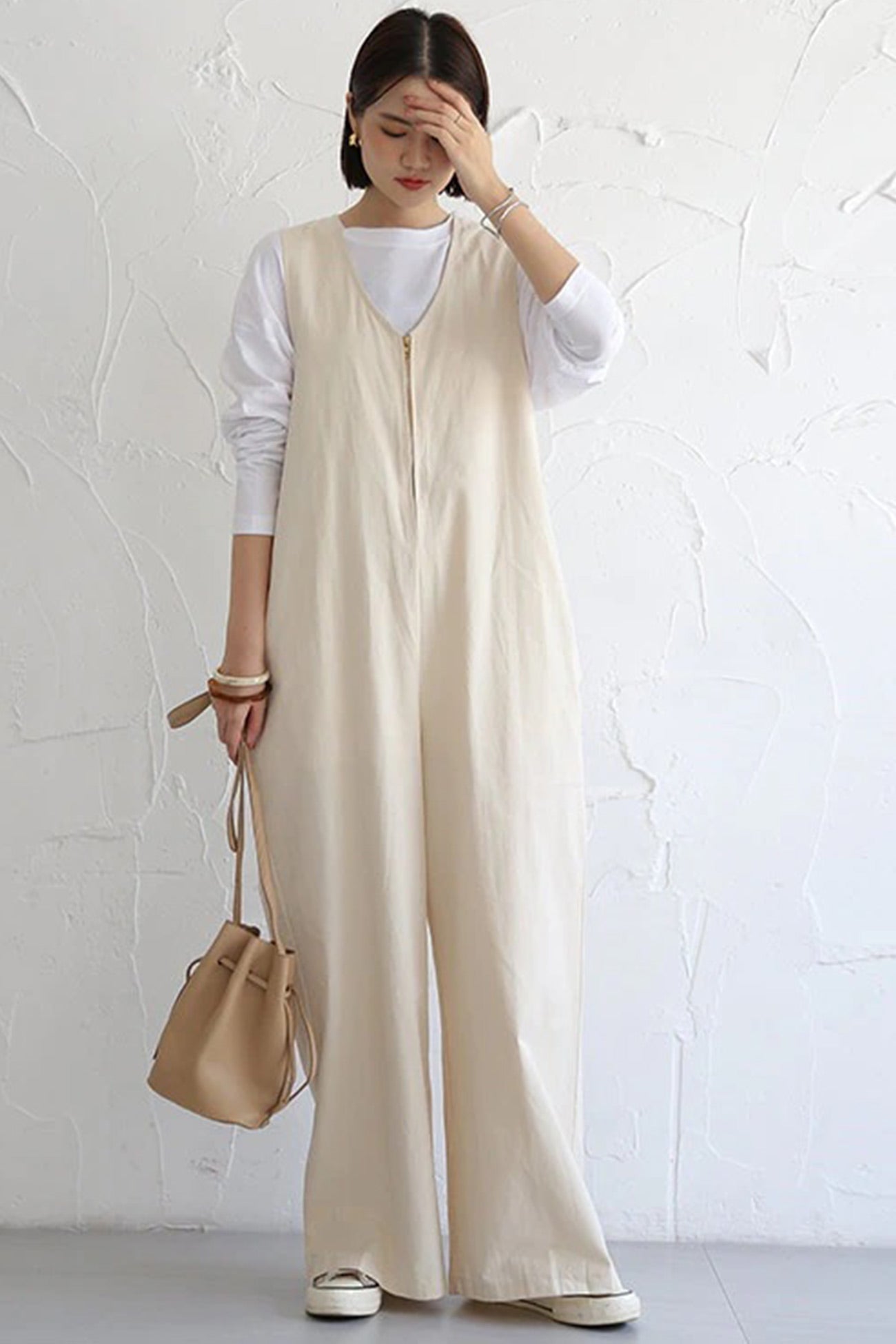 Clara | Sleeveless wide leg jumpsuits with zip front closure