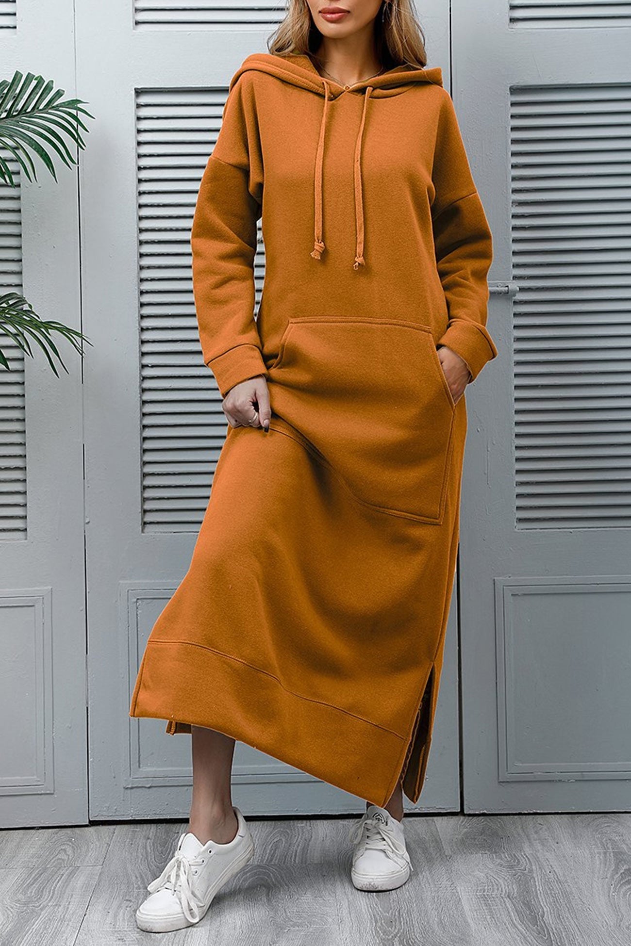 Nadia | Solid hooded dress with pockets and a slit at the hem