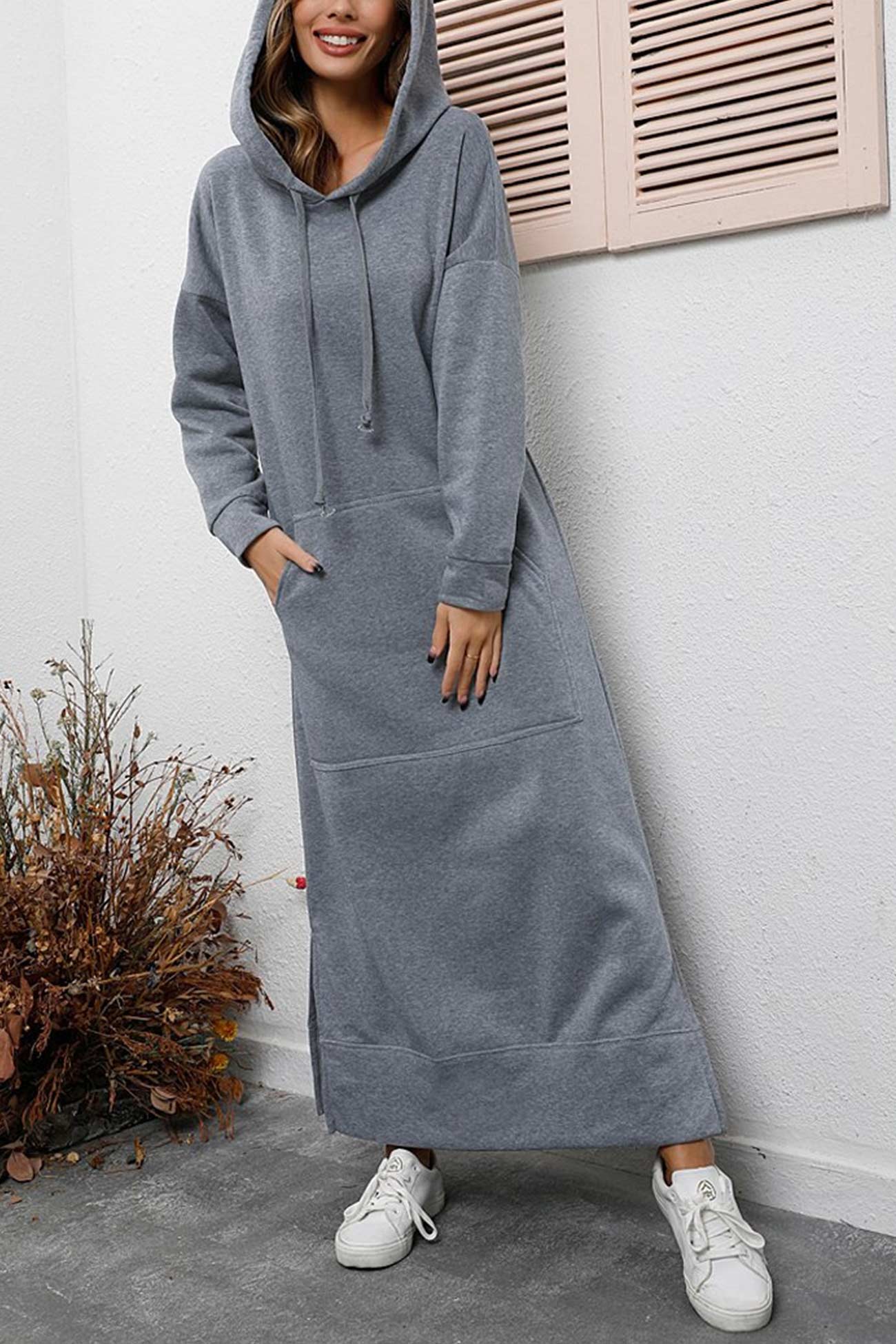 Nadia | Solid hooded dress with pockets and a slit at the hem