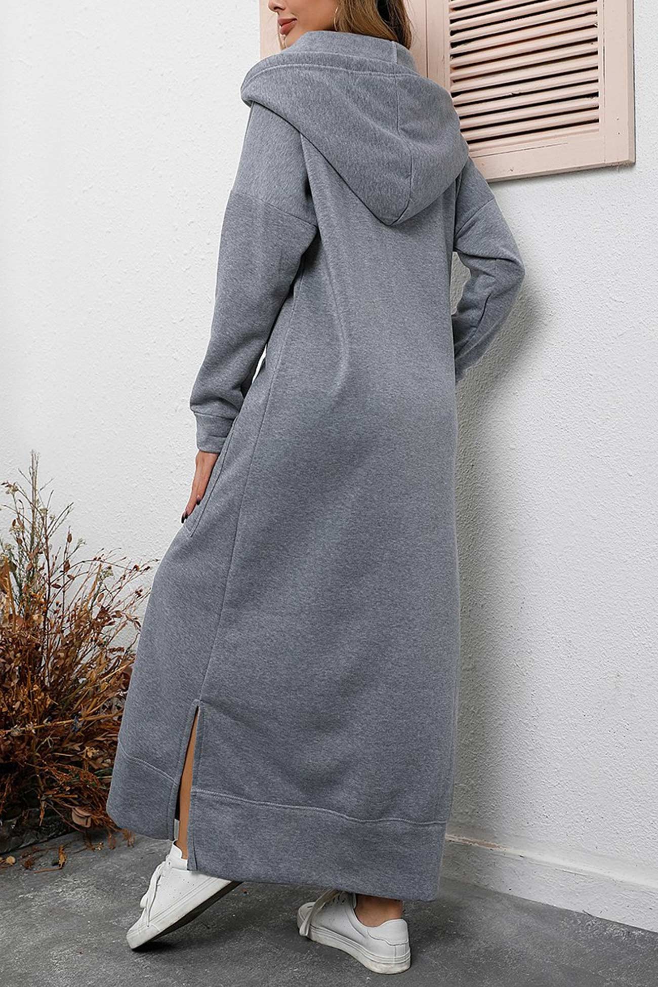 Nadia | Solid hooded dress with pockets and a slit at the hem