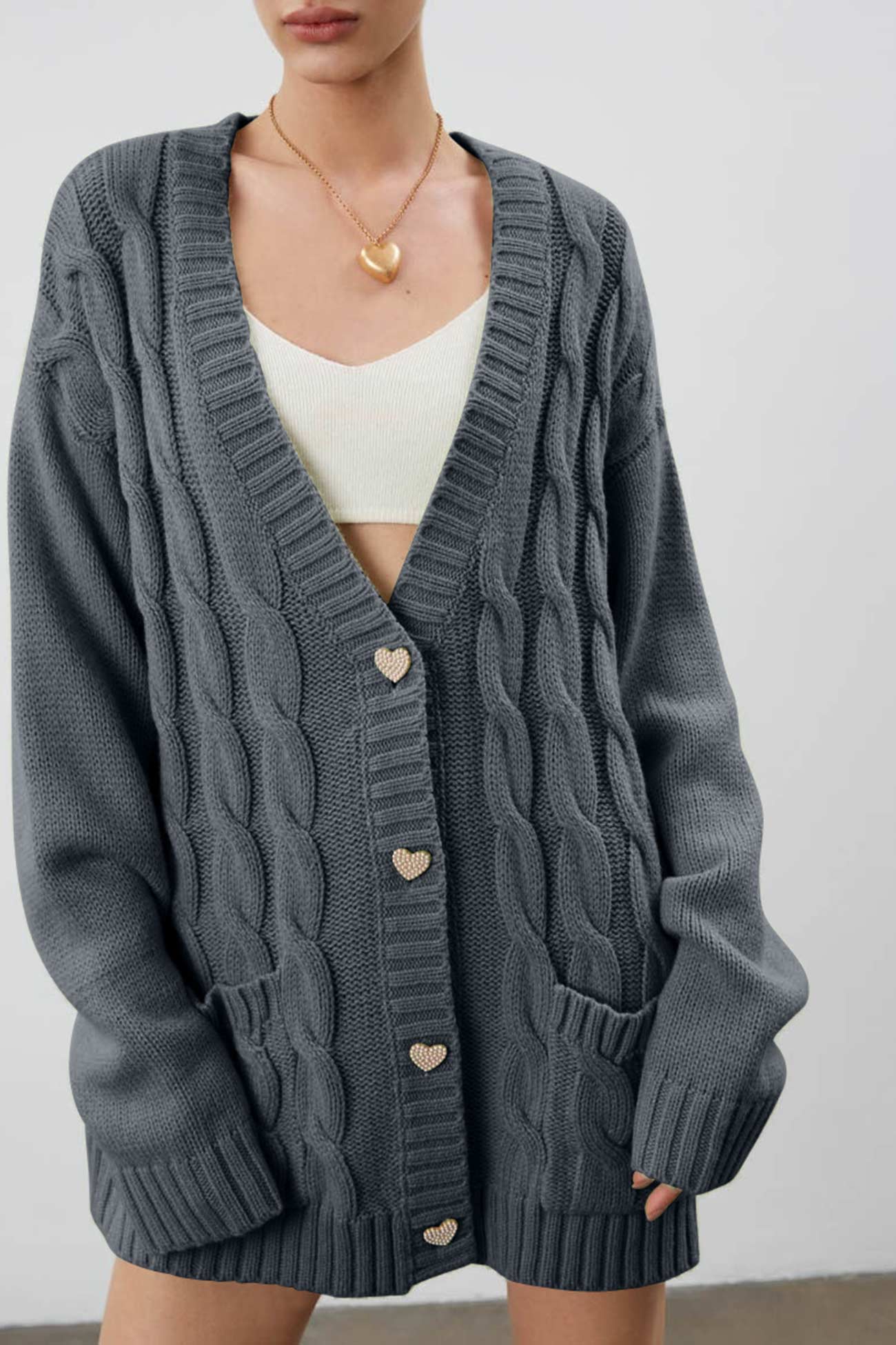 Pilar | Solid single breasted cable knit cardigan