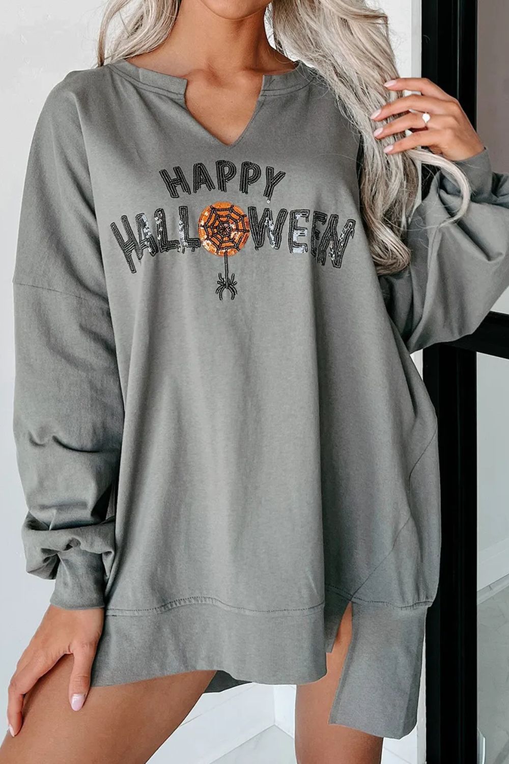 Janine | Long sleeve sweatshirt with notched sequin letter graphic
