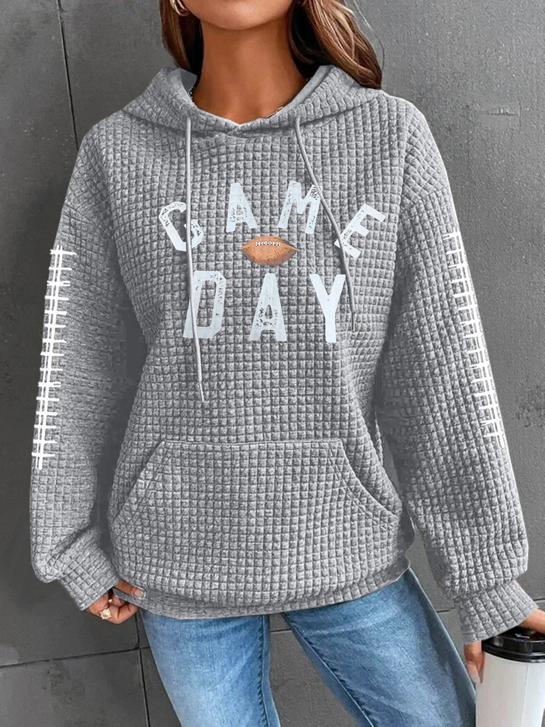 Geraldine | Drawstring football hoodie with long sleeves