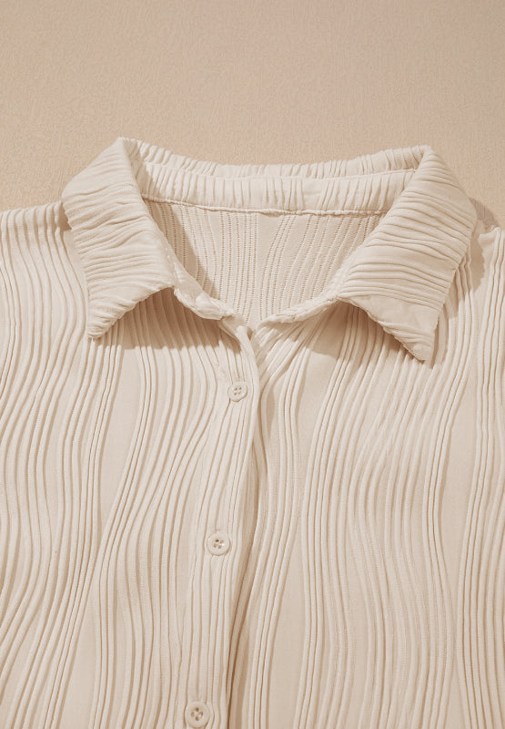Xenia | Long sleeve button down shirt with a structured collar and collar