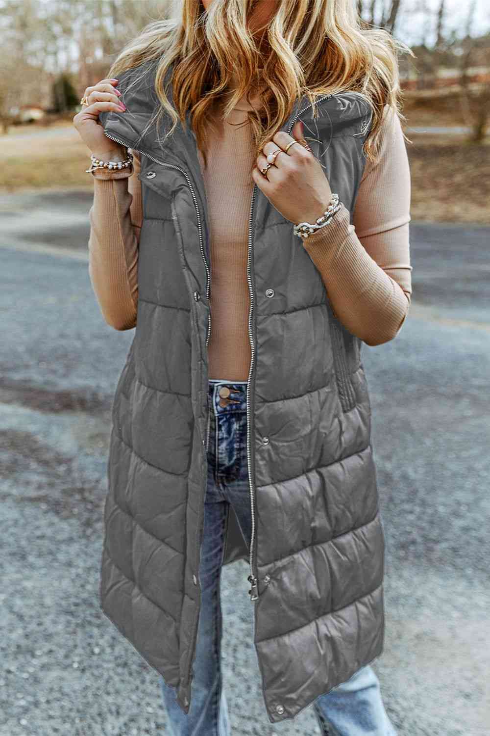 Hortensia | Long, sleeveless, padded hooded coat