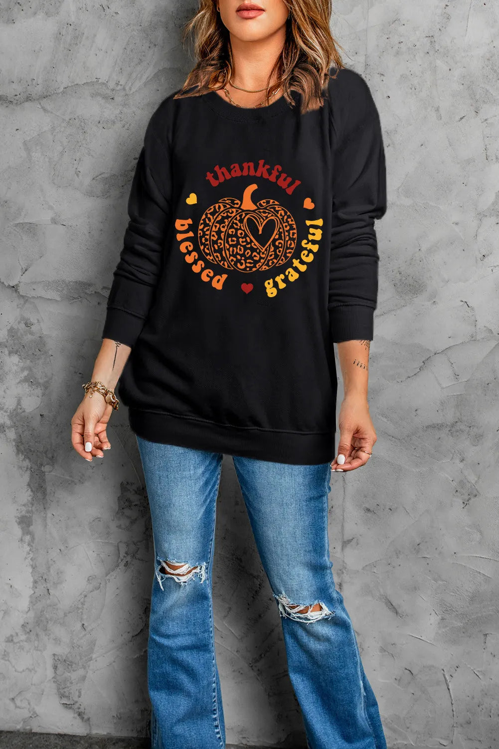 Olga | Long-sleeved sweatshirt with a pumpkin graphic
