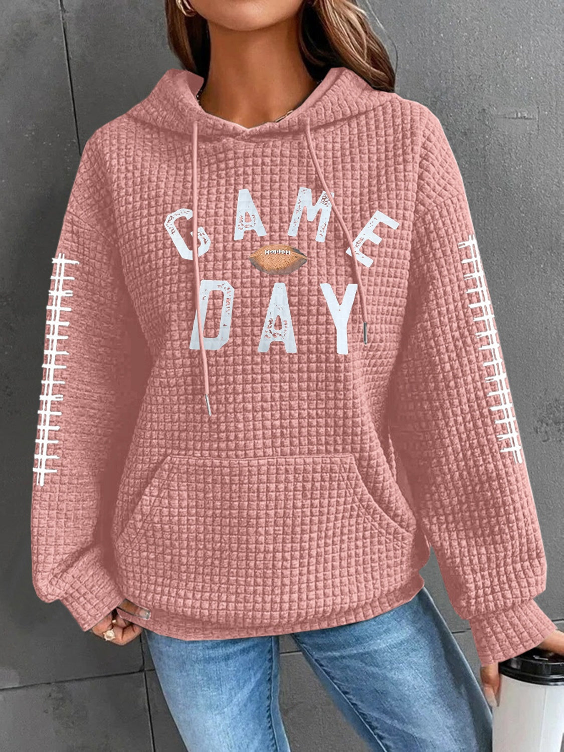Geraldine | Drawstring football hoodie with long sleeves