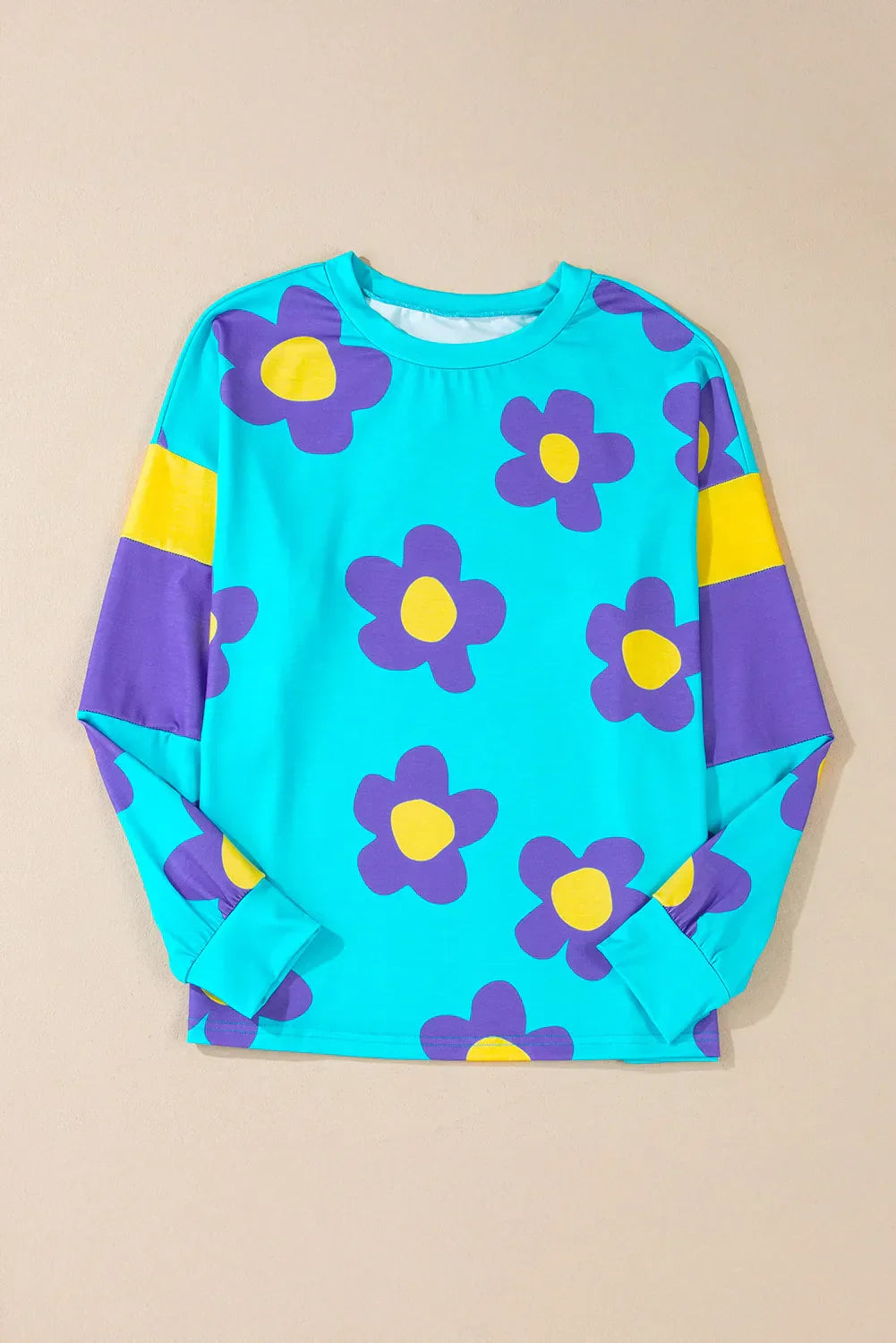 Jana | Long-sleeved blouse with a contrasting floral crew neck