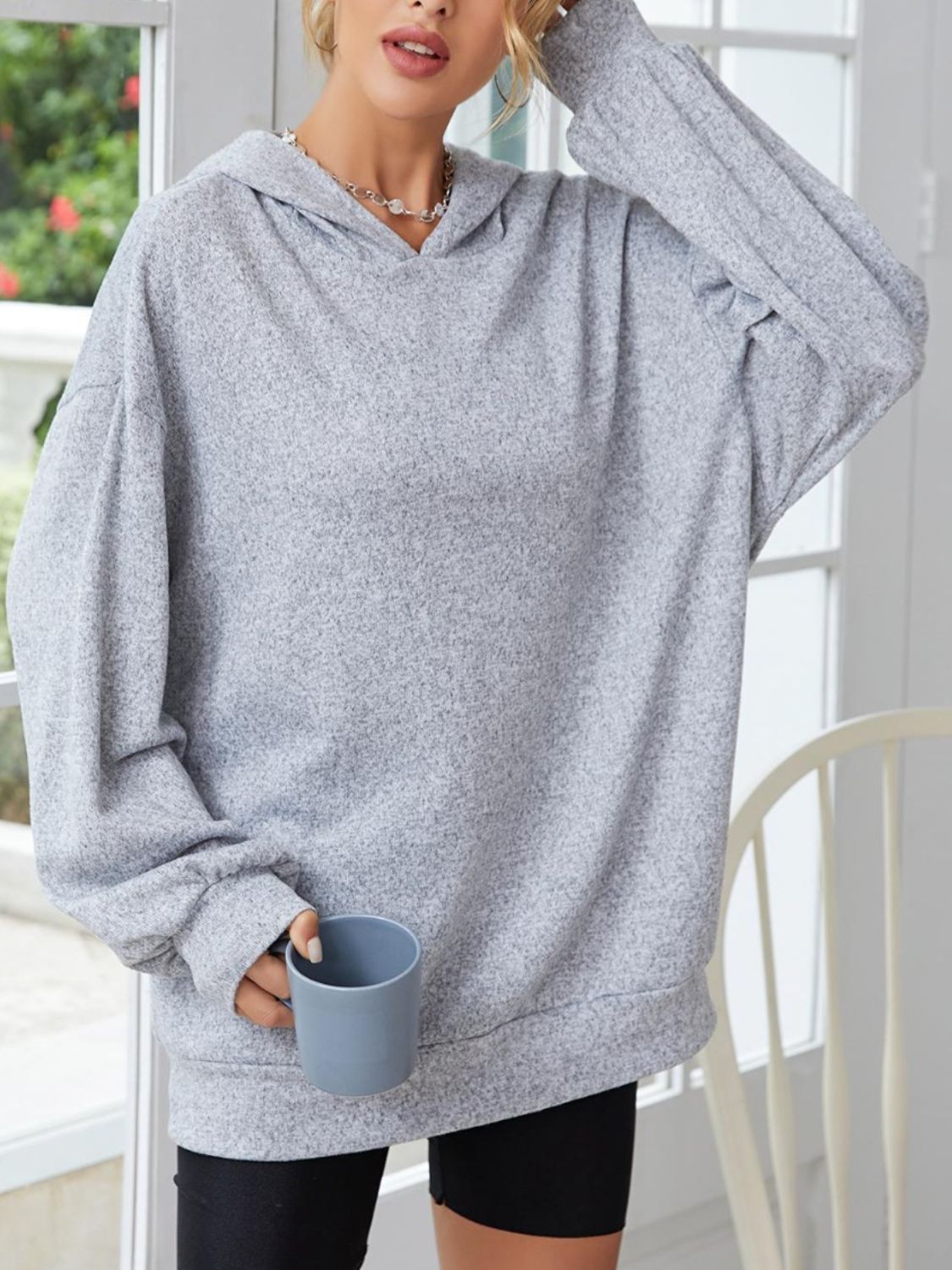 Adelheid | Long-sleeved hoodie with low shoulders and ears
