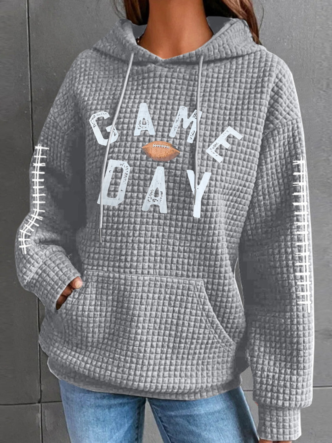 Geraldine | Drawstring football hoodie with long sleeves
