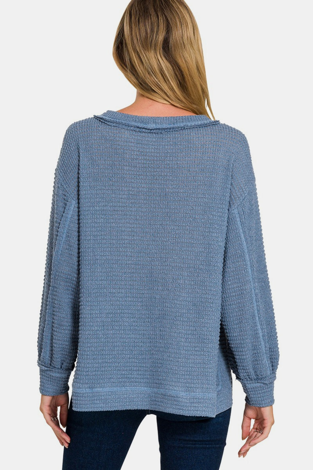 Nerea | Long sleeve top with exposed seam and side slit