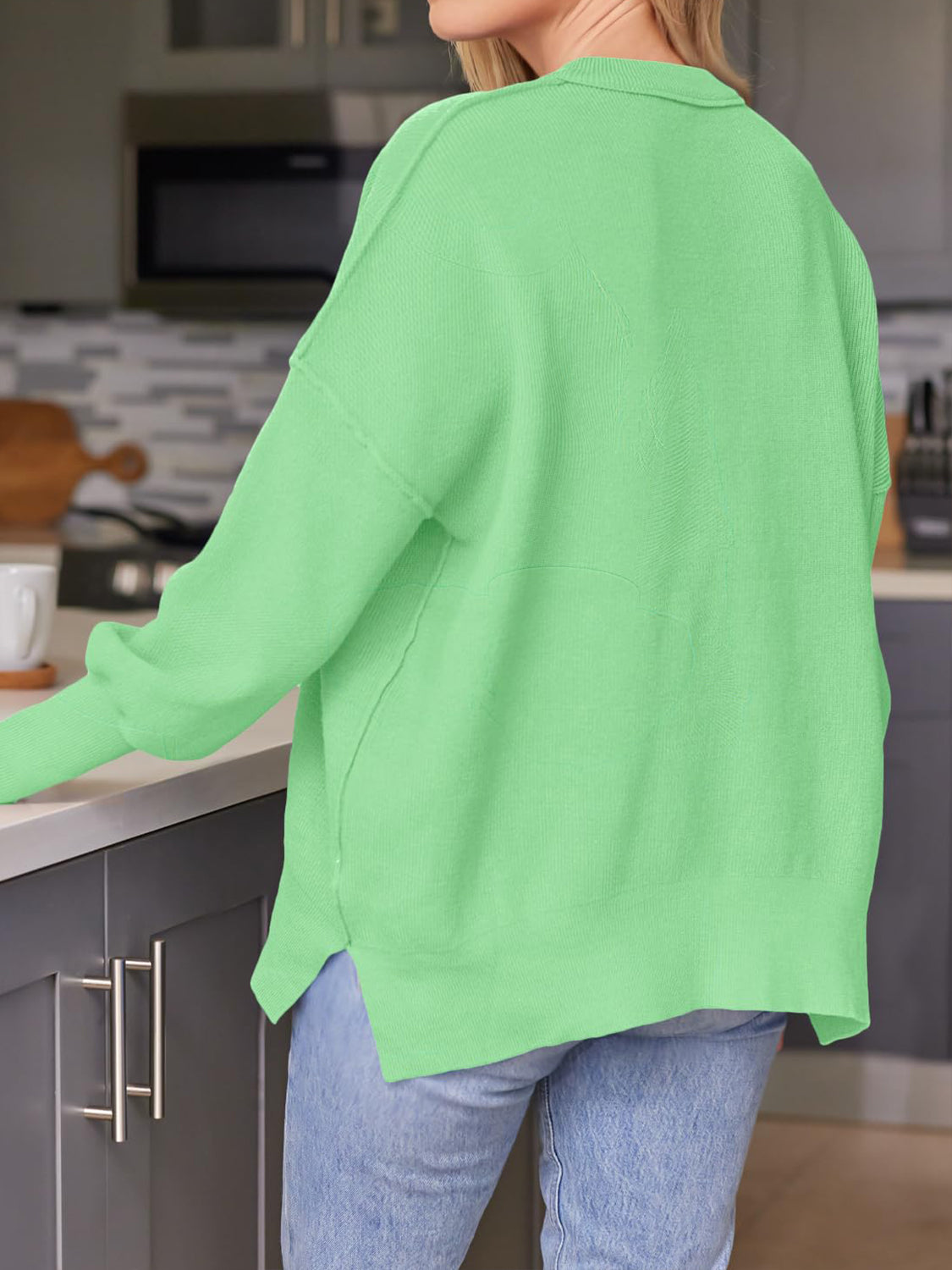 Evelyn | Slit sweater with a crew neck and dropped shoulders