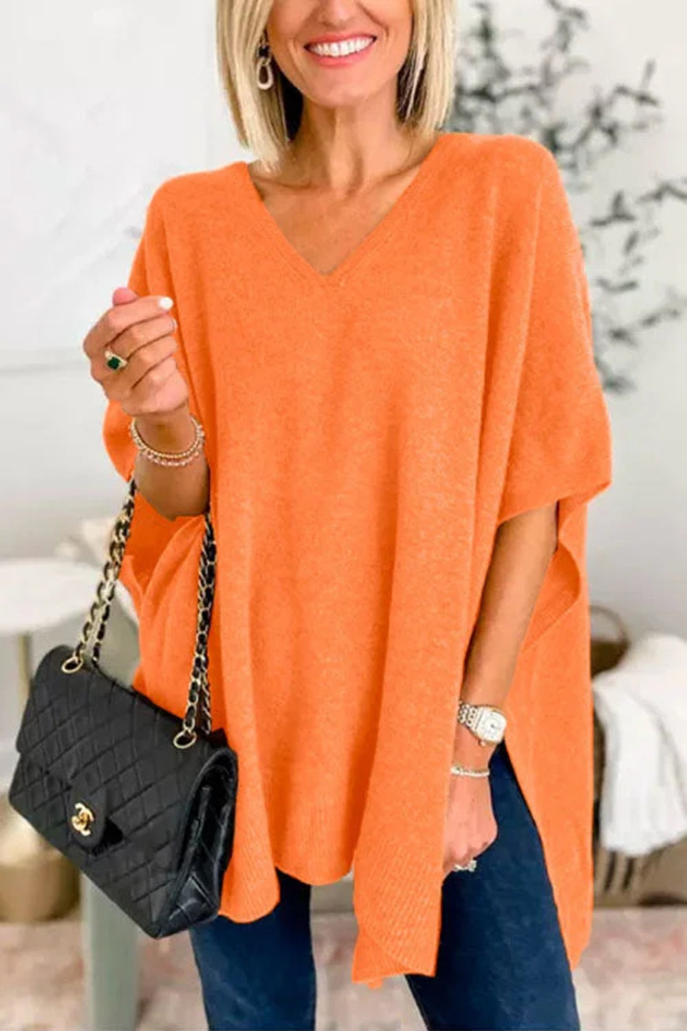 Erika | Slit knit top with V-neck and half sleeves