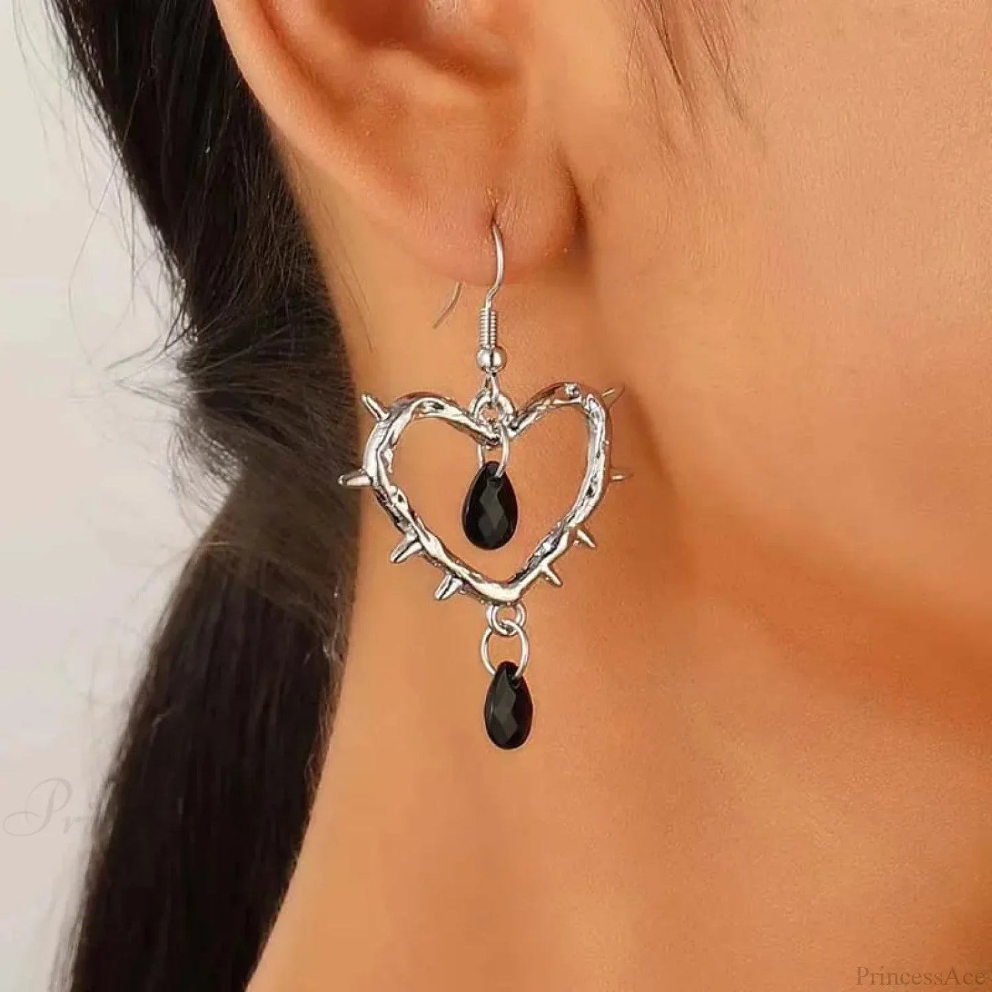 Dark Spiky Ebony Flow Oil Love Earring