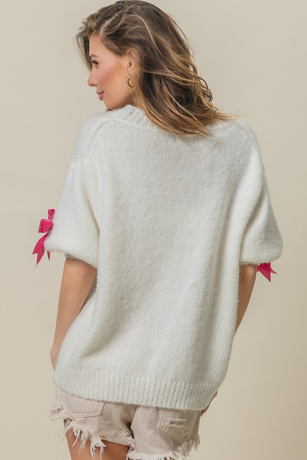 Victoria | Jumper with sequin bow and puff sleeves
